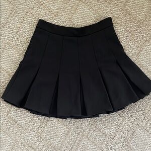 Easy to wear black pleated mini skirt
